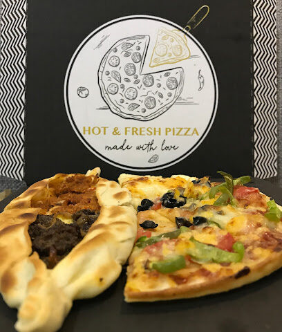 Saudi Attire tailor/Pizza shop - Buraydah - +966 53 285 5210