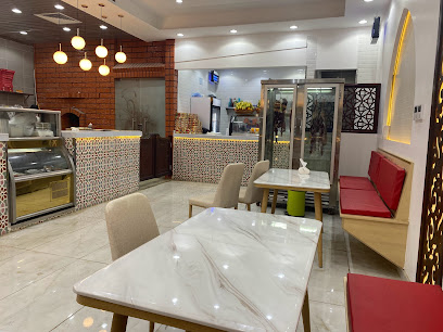 Pizza Zain Albawadi بيتزا زين البوادي - Tabuk - +966 55 665 7900